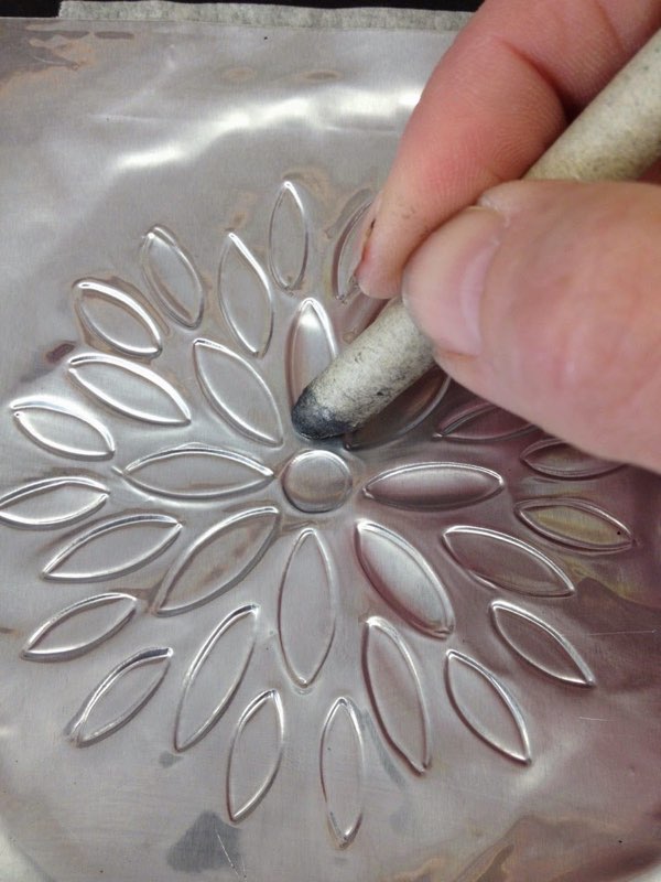 Tin embossing detail
